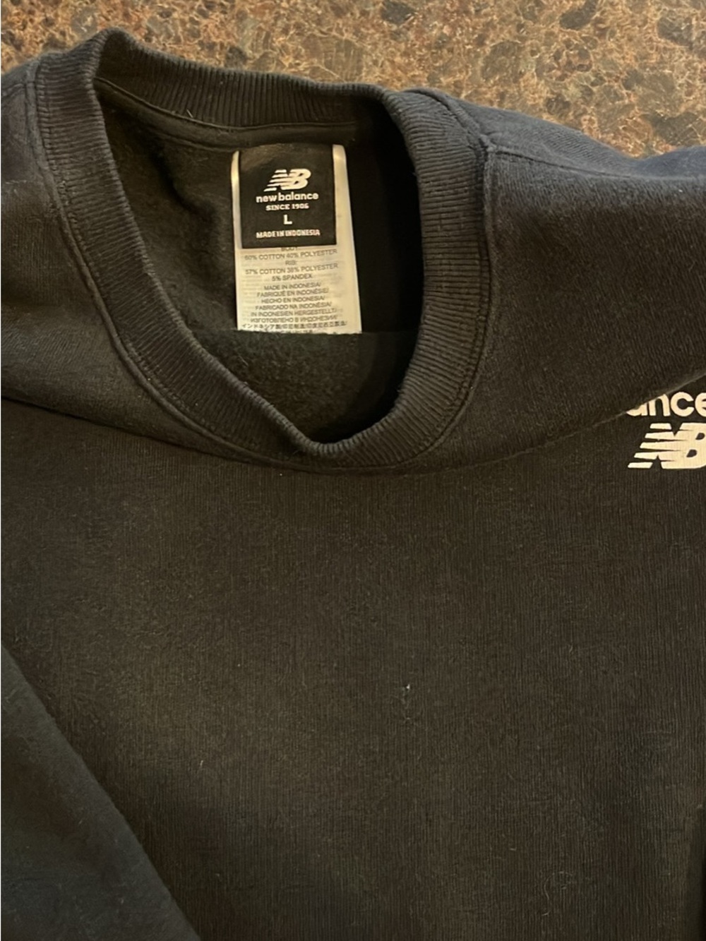 New Balance Men’s Black Crewneck Pullover with Subtle Logo